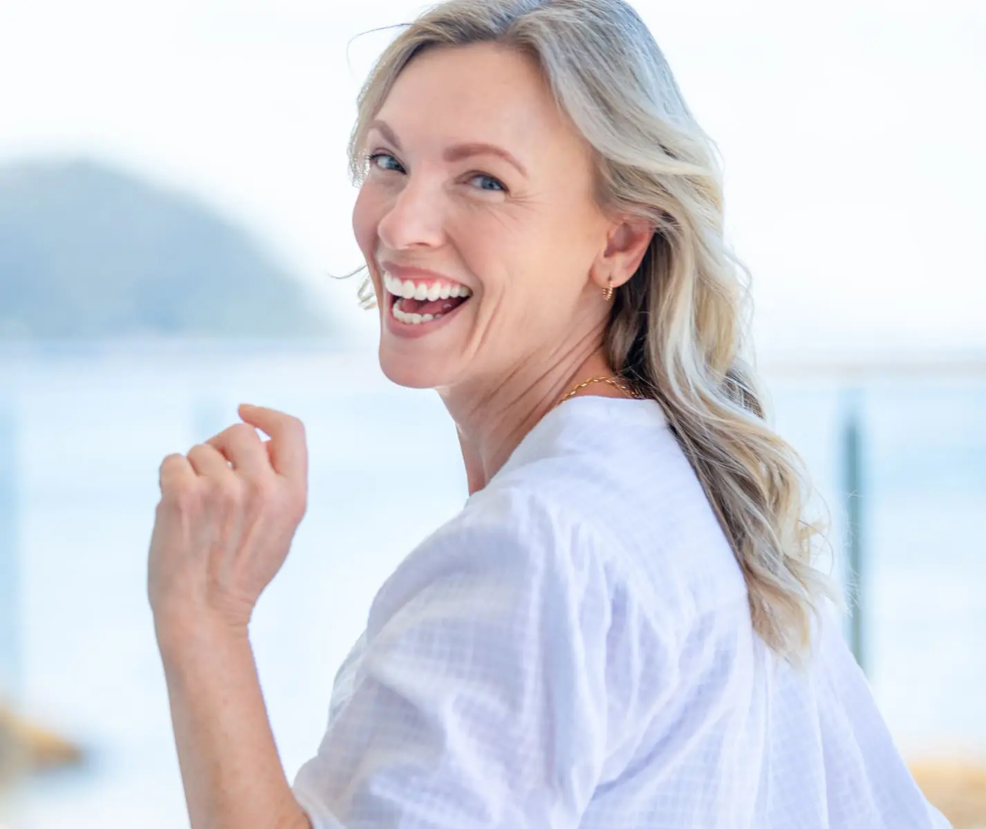 Beautiful mature woman portrait at waterfront house. Skinvive by Juvederm in Charleston County, SC